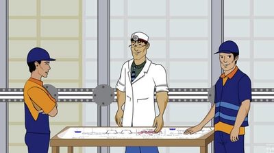 The Garbage Doctor and two of the team at the drawing table, designing a machine